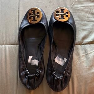 Tory Burch Black Flats with Gold Medallion